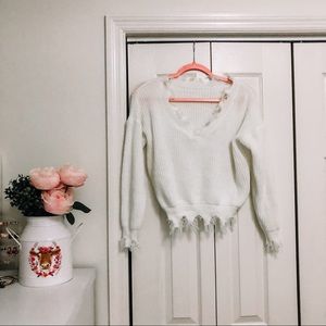 white distressed sweater